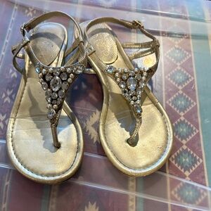 Unisa Gold Jeweled T-Strap Sandals